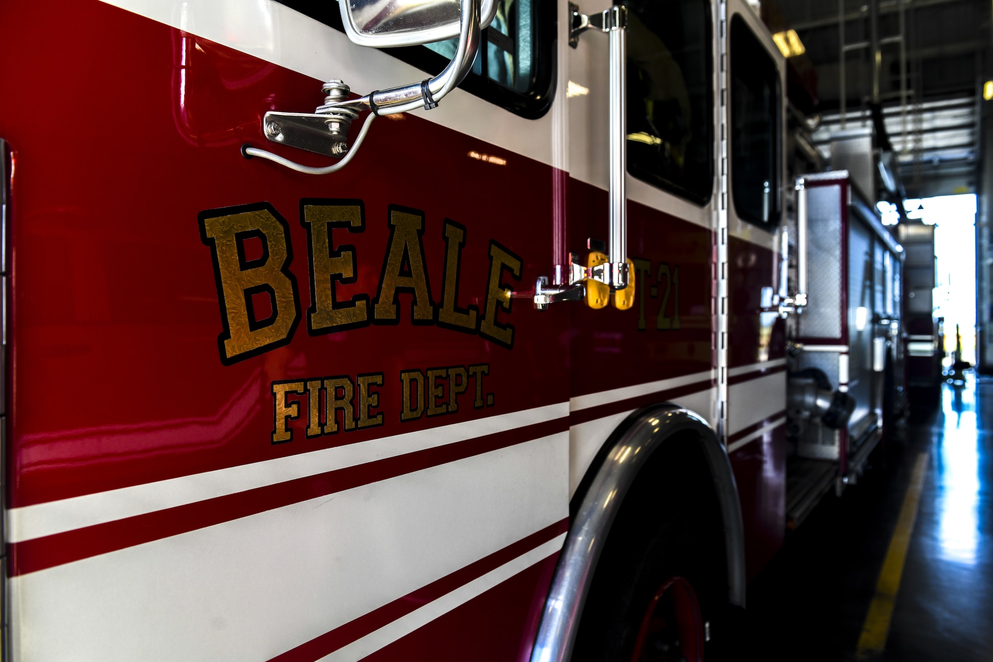 A fire engine is parked in the department loading bay at Beale Air Force Base