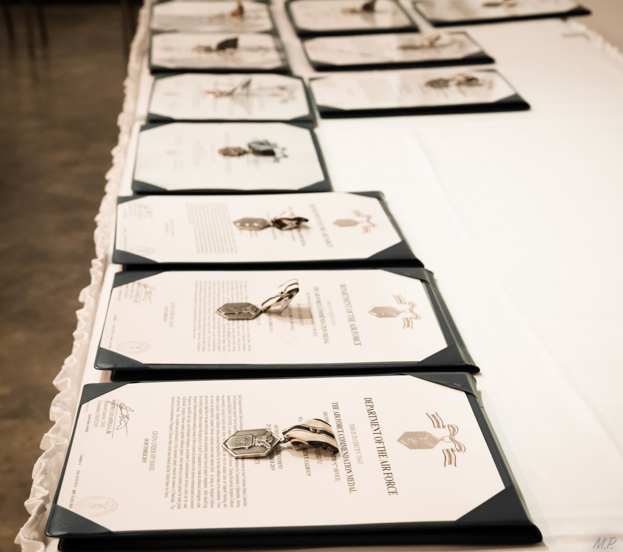 Awards lay on a table at the Museum of the Mighty Eighth Air Force in Savannah, Georgia, for a valorous awards ceremony honoring the achievements of Special Tactics Airmen from the 17th Special Tactics Squadron’s Detachment 1 Feb. 18, 2020.