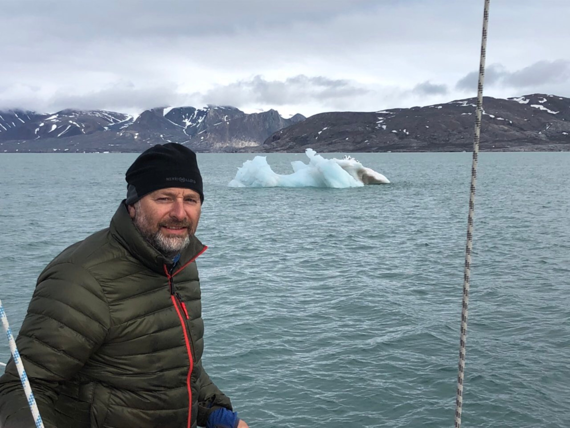 Mr. Stephen Skinner poses on the deck of his sailboat, while sailing to island of Svalbard, north of the Arctic Circle.
