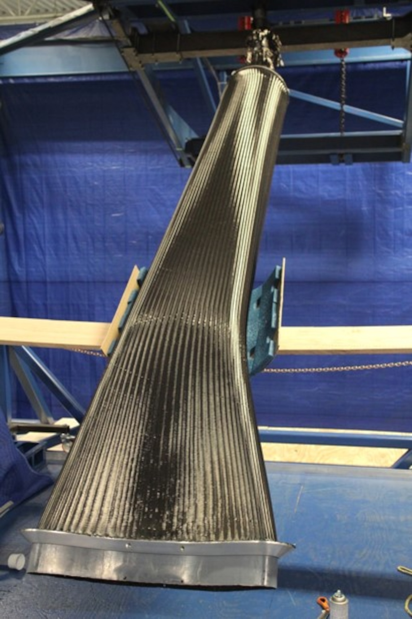 An 11-foot long unmanned aircraft system inlet duct preform is shown prior to resin infusion. (Courtesy photo)