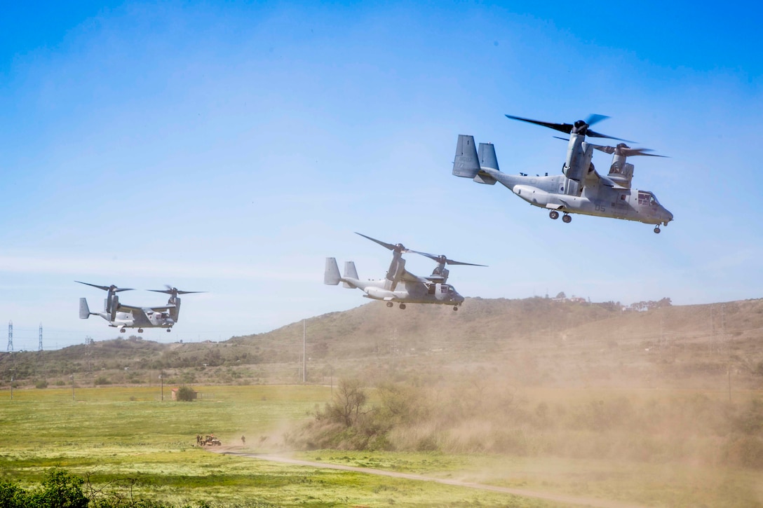 Three MV-22B Ospreys assigned to Marine Tiltrotor Squadron (VMM) 362, Marine Aircraft Group (MAG) 16, 3rd Marine Aircraft Wing (MAW), depart a simulated weapons engagement zone during an air assault in support of 1st Battalion, 3rd Marine Regiment, at Camp Pendleton, Calif., Feb. 26, 2020. Air assaults enable commanders to avoid enemy surfaces, exploit gaps, and maintain the flexibility and mobility needed to strike objectives in otherwise inaccessible areas during a Marine Air Ground Task Force mission. This culminating event signified that VMM-362 has reached full operational capability since its reactivation in 2018, ultimately increasing the lethality of 3rd MAW. (U.S Marine Corps photo by Lance Cpl. Julian Elliott-Drouin)