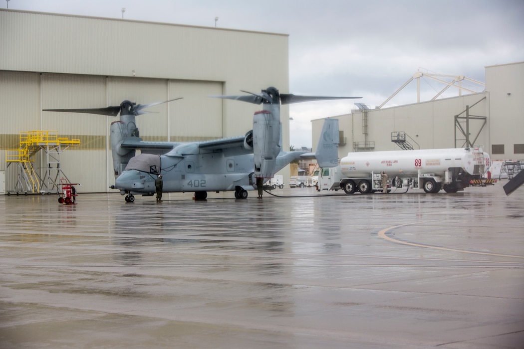 U.S. Marines with Marine Medium Tiltrotor Squadron 362, Marine Aircraft Group 16, 3rd Marine Aircraft Wing, enforce precautionary measures during the maintenance of MV-22 Osprey on Marine Corps Air Station Miramar, Calif., March 19, 2020. The purpose of these measures is to mitigate the spread of COVID-19 while continuing to perform mission essential tasks.(U.S. Marine Corps photo by Lance Cpl. Julian Elliott-Drouin)