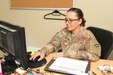 U.S. Army Msg. Jody Wilson works as the Task Force Spartan Historian, Camp Arifjan, Kuwait, March 26, 2020. (U.S. Army photo by Sgt. Andrew Valenza)