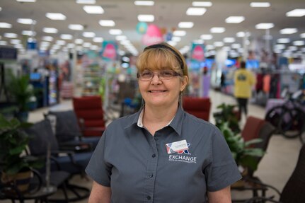 Lesley Richardson, a department manager for the Base Exchange main store, poses for a photo in the Exchange on Joint Base Charleston, S.C., March 23, 2020.