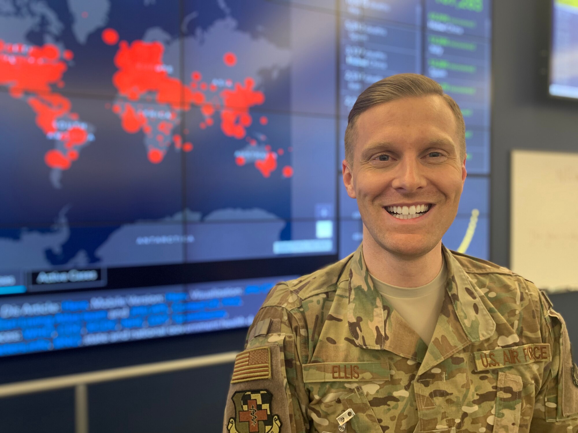 U.S. Air Force Capt. Brynt Ellis, medical readiness officer, 127th Medical Group, Selfridge Air National Guard Base, Michigan, works at the State Emergency Operations Center in response to the COVID-19 pandemic, Lansing, Mich., March 28, 2020.
