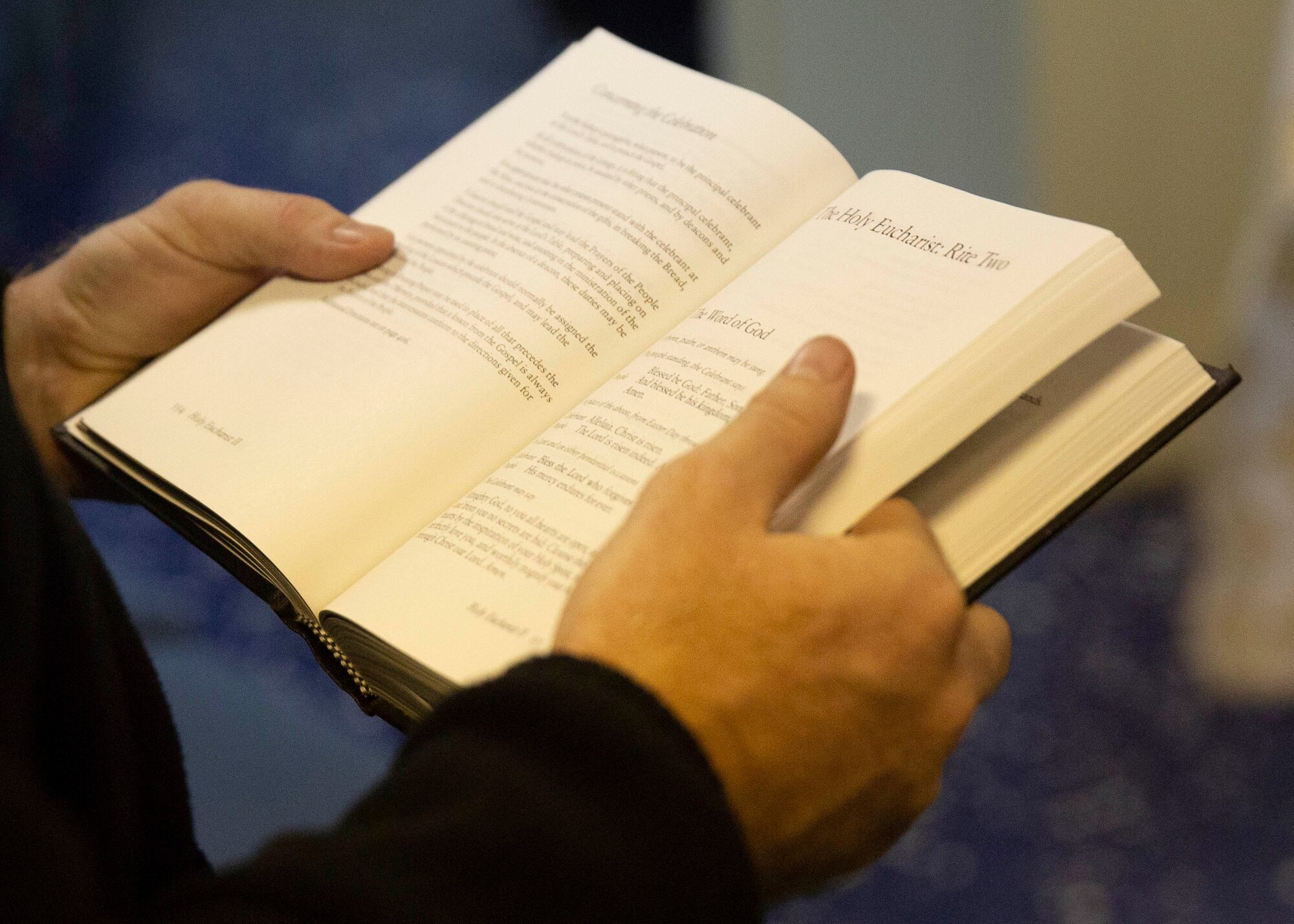 A Sailor reads a bible during Protestant church service aboard USS Iwo Jima (LHD 7), Oct. 14. Church services allow Marines and Sailors to practice their faith while underway. (U.S. Marine Corps photo by Lance Cpl. Gumchol Cho)