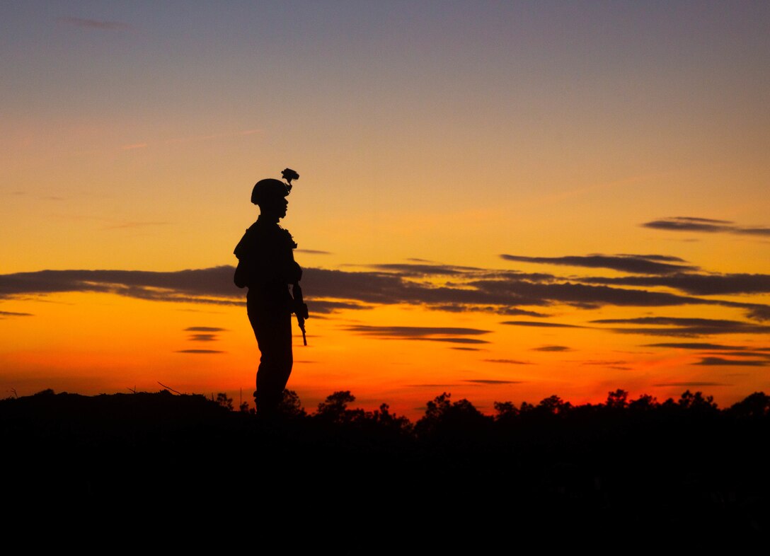 U.S. Marine Corps Cpl. Geovanni Cotovasquez, a data systems administrator with Headquarters Company, 2d Marine Division conducts convoy operations during a Battalion Field Exercise at Camp Lejeune, North Carolina, March 18, 2020.The exercise focused on mission readiness, lethality, and combat effectiveness within the Division. The training included defensive combat procedures, chemical weapons readiness, communications, and convoy operations. (U.S. Marine Corps photo by Lance Cpl. Brian Bolin Jr.)