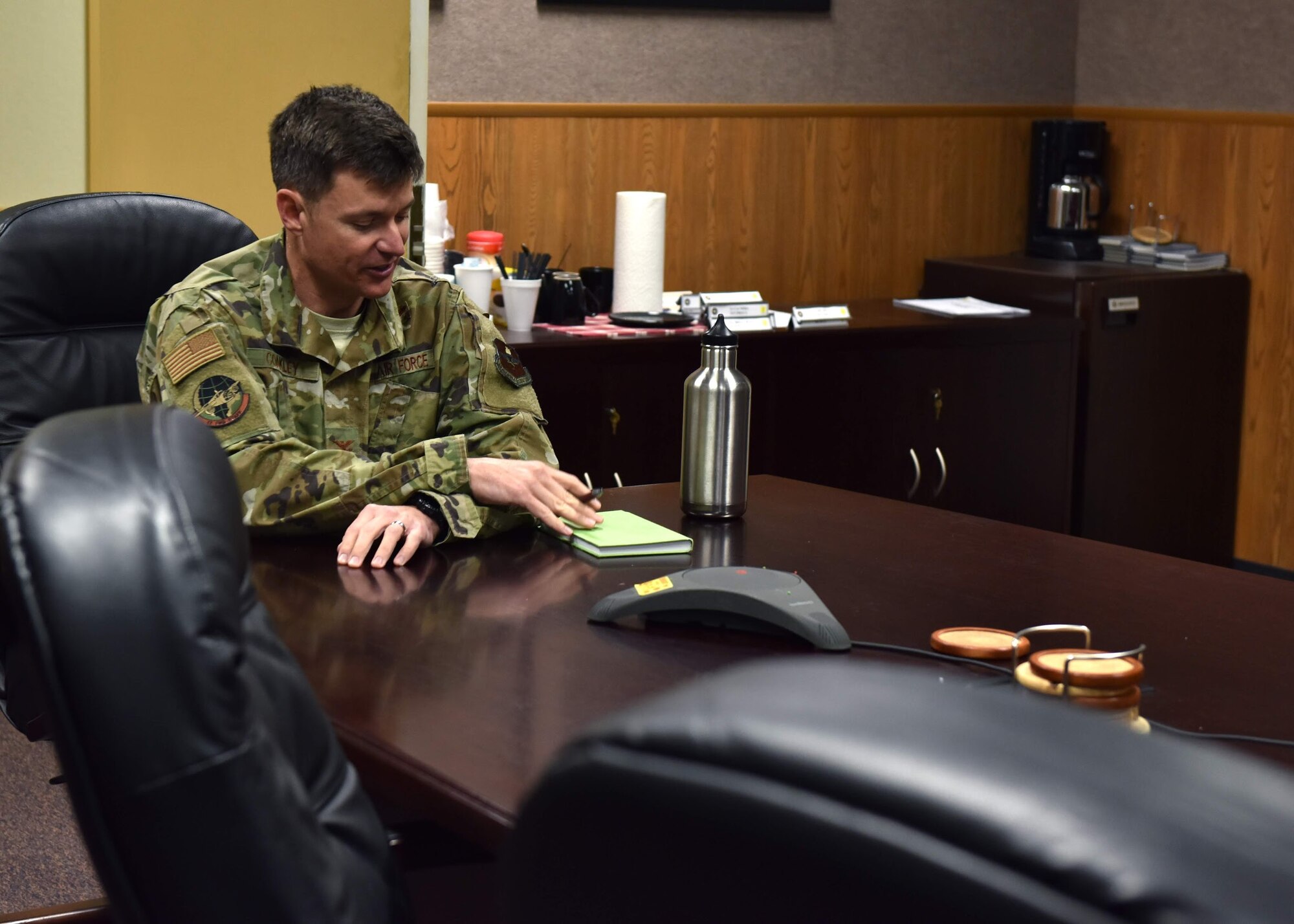 U.S. Air Force Col. Thomas Coakley, 17th Training Group commander, conducts a meeting during the training tactical pause to address options for altering training while still accomplishing the mission to train military members on Goodfellow Air Force Base, Texas, March 30, 2020. Due to COVID-19, commanders are exploring all available options to continue training students while keeping all members and their families safe. (U.S. Air Force photo by Senior Airman Seraiah Wolf)