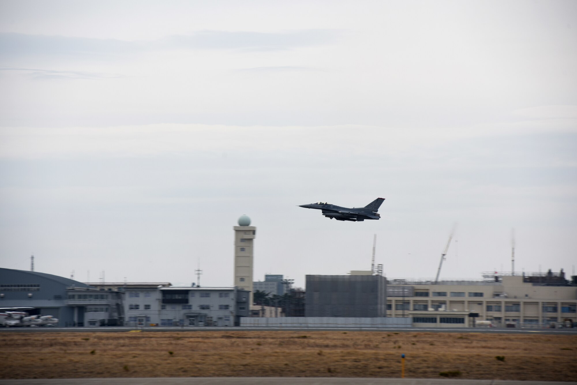 A U.S. Air Force F-16 Fighting Falcon, assigned to the 13th Fighter Squadron, Misawa Air Base, Japan, takes off to execute Exercise PACIFIC WEASEL, Friday, March 27, 2020. The 35th Fighter Wing began executing the PAC WEASEL exercises in 2018, and each iteration has been refined and improved upon since its inception. On 27 March, U.S. Air Force members had the opportunity to integrate with Japan Ground Self-Defense Force members and assets. (U.S. Air Force photo by Tech. Sgt. Chris Jacobs)