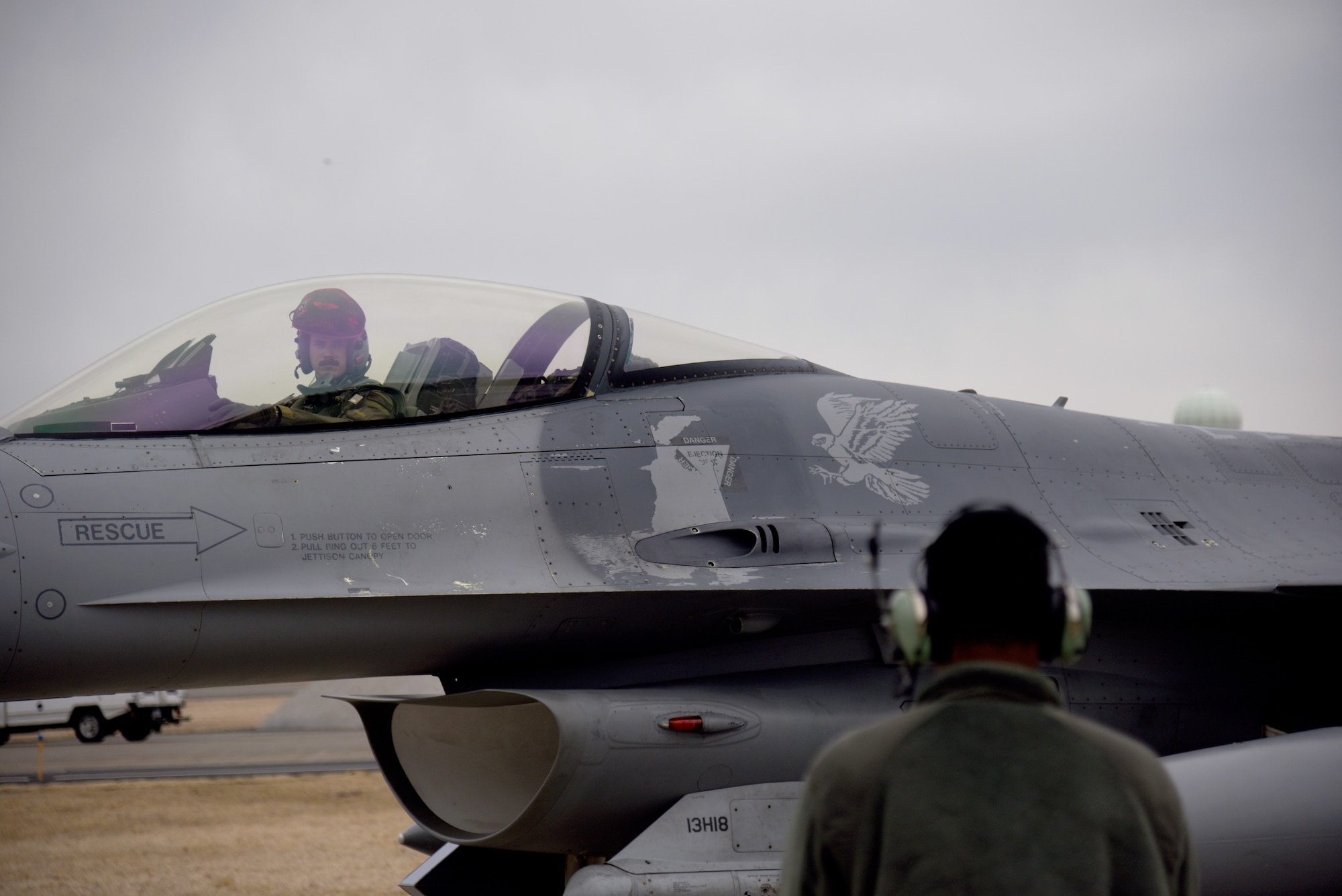 U.S. Air Force Capt. Peter Magness, 13th Fighter Squadron electronic combat pilot, Misawa Air Base, Japan, parks his F-16 Fighting Falcon after Exercise PACIFIC WEASEL, Friday, March 27, 2020. The 35th Fighter Wing began executing the PAC WEASEL exercises in 2018, and each iteration has been refined and improved upon since its inception. On 27 March, U.S. Air Force members had the opportunity to integrate with Japan Ground Self-Defense Force members and assets. (U.S. Air Force photo by Tech. Sgt. Chris Jacobs)