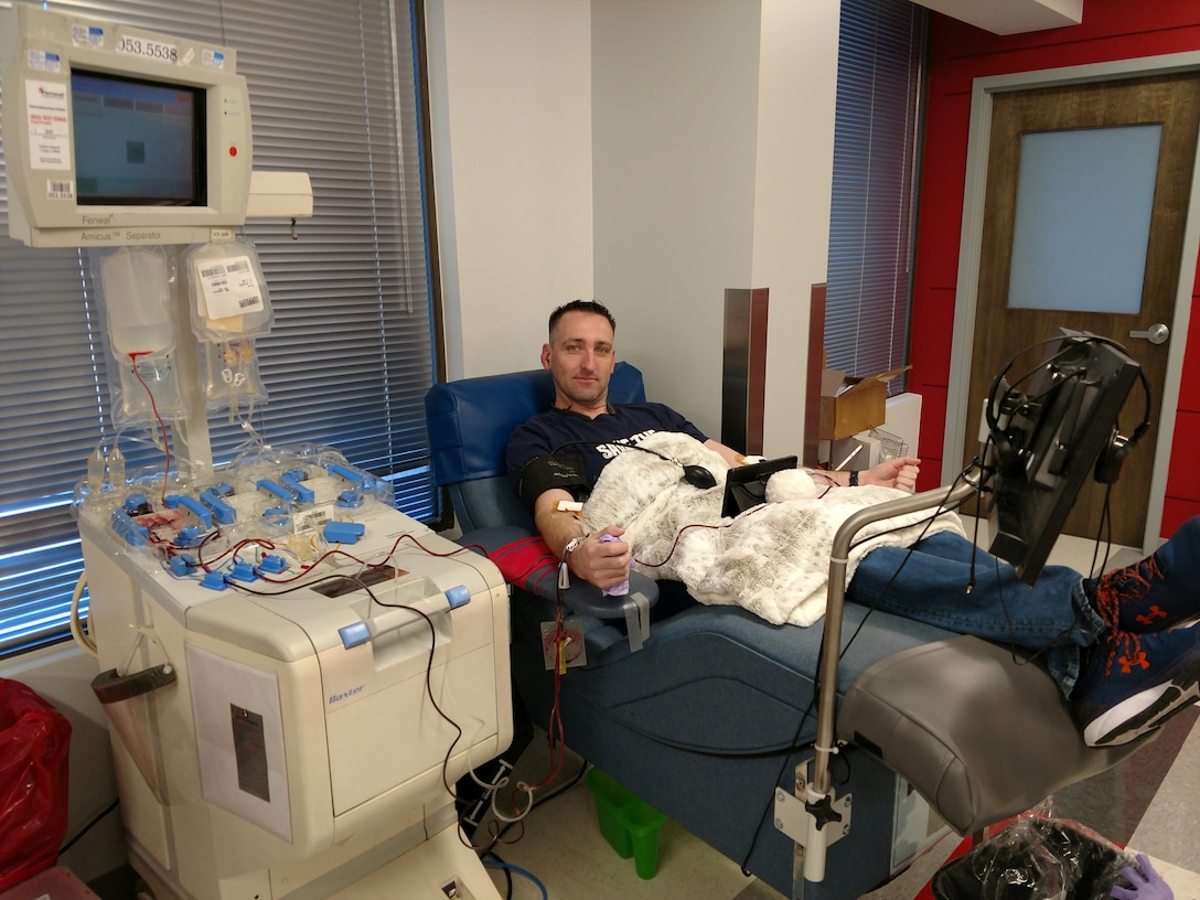 Sgt. First Class Matthew Brueggeman, a member of the Defense Intelligence Agency Chaplain’s Office, donates platelets to the Red Cross, March 22. Brueggeman is a regular platelet donor, donating up to 24 times a year. (Photo courtesy of Matthew Brueggeman)