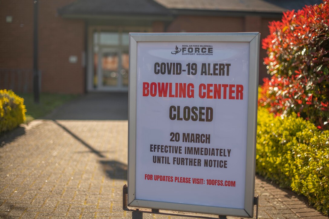 A “closed” sign is posted outside the bowling center at RAF Mildenhall, England, March 25, 2020. Base services have been reduced and extra precautions put in place to help prevent the spread of COVID-19. (U.S. Air Force photo by Staff Sgt. Luke Milano)