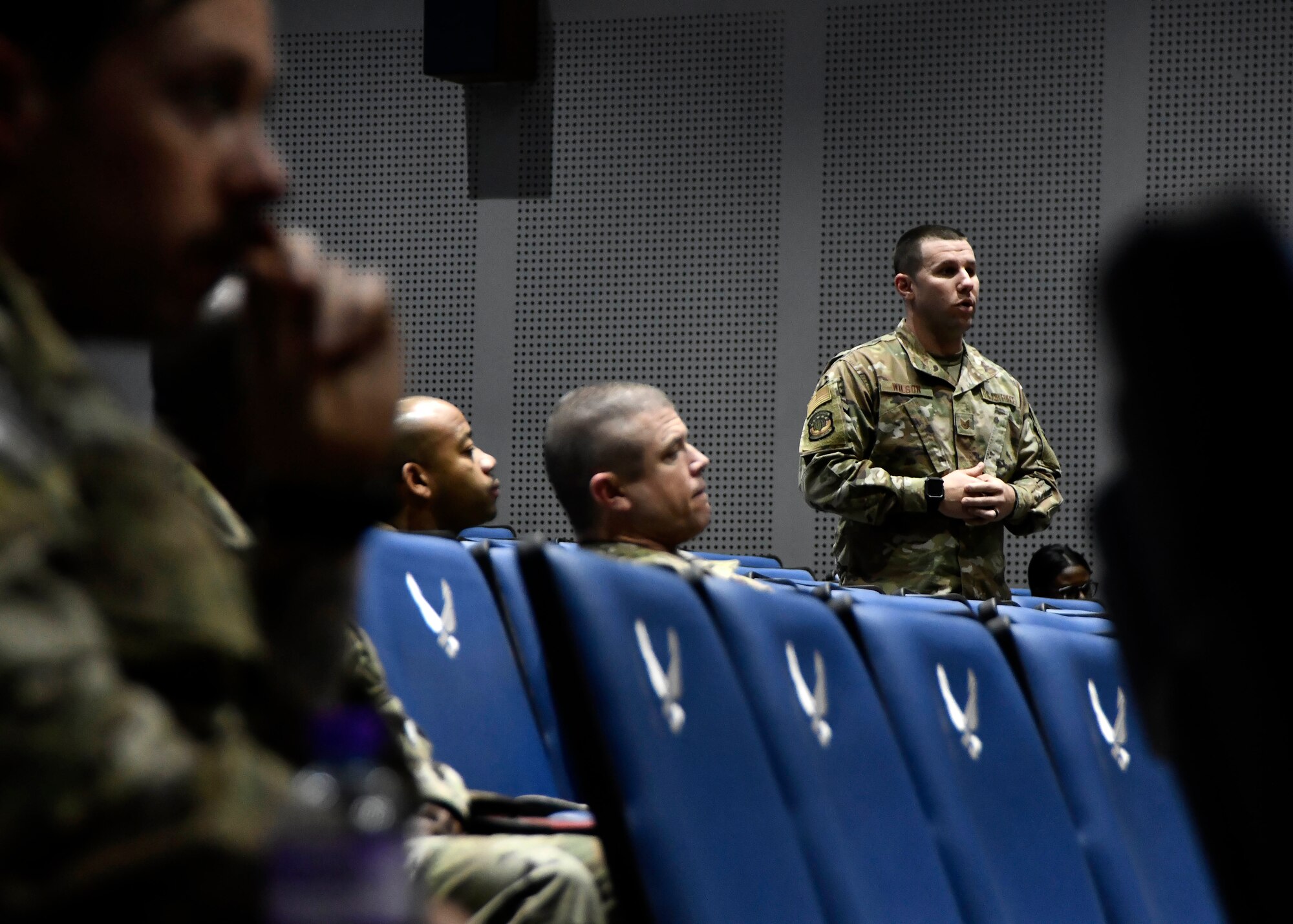 Airmen participate in group discussion.