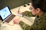 Senior Airman Elise, an analyst assigned to the 178th Wing, analyzes a map of counties throughout Ohio March 30, 2020, at the Defense Supply Center Columbus. Elise is serving on the Joint Task Force 37 collecting data on coronavirus cases, hospitalizations and available hospital resources across the state, as well as providing weather and route information for the JTF-37 task forces supporting local food banks.