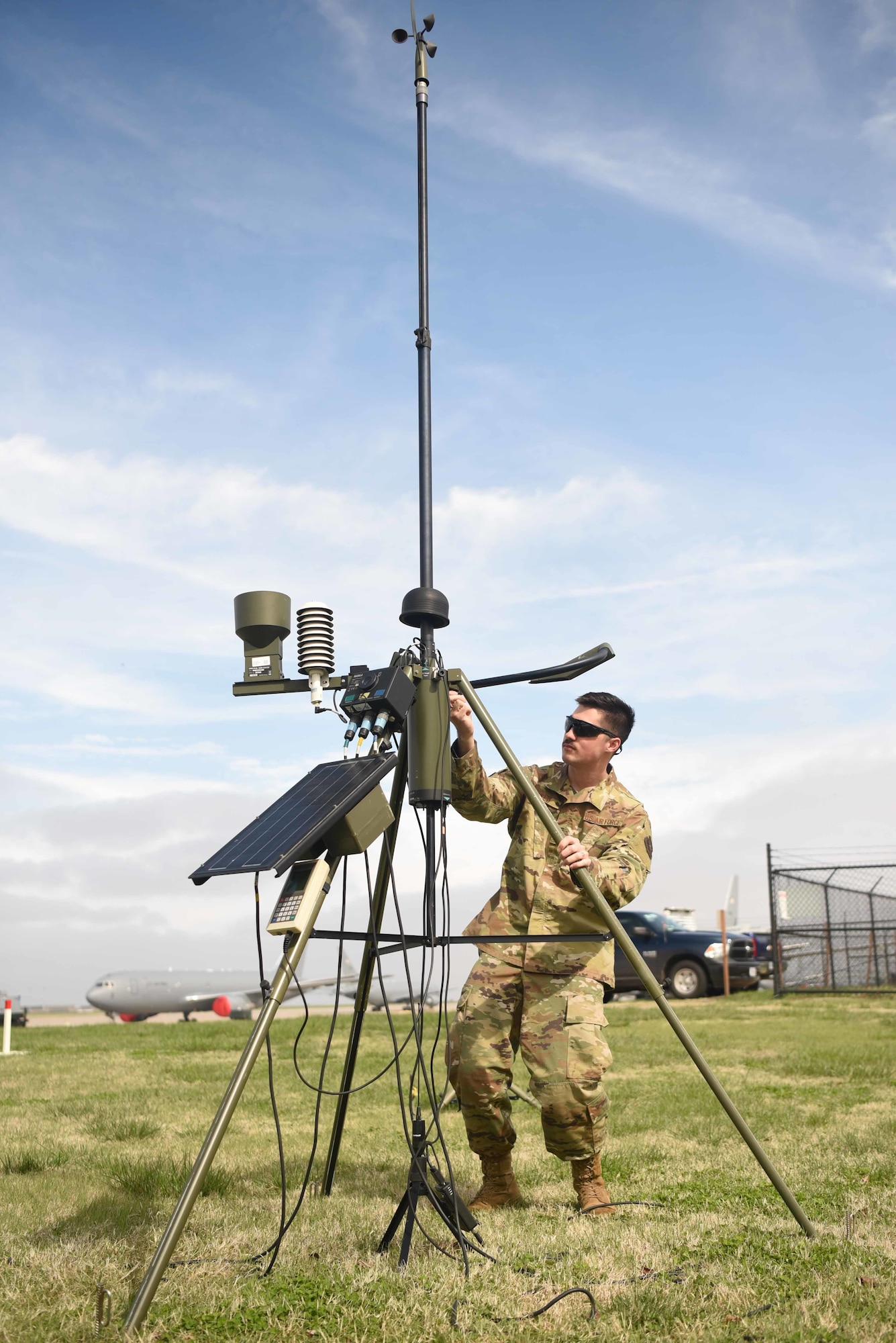 Staff Sgt. Jordan Field, 22nd Operation Support Squadron weather forecaster, checks the tactical meteorological observing system March 26, 2020, at McConnell Air Force Base, Kansas. TMQ-53 is capable of delivering real-time weather updates such as atmospheric pressure, wind speed and direction, cloud ceilings, and lighting strike information in 5-second intervals. (U.S. Air Force photo by Senior Airman Alexi Bosarge)