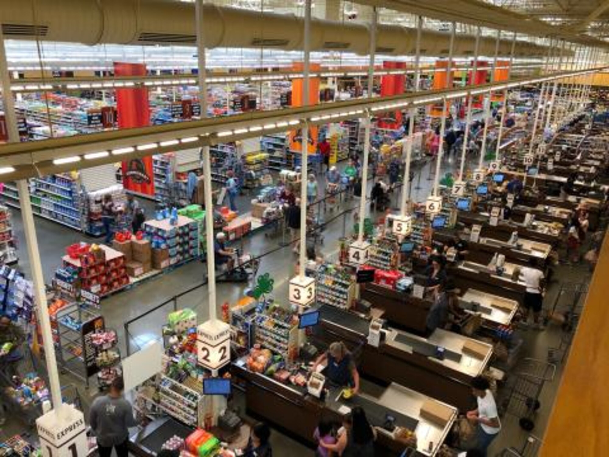 Commissary staff in Jacksonville, Florida, serve customers while praticing social distancing.