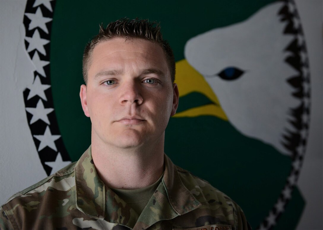 U.S. Air Force Tech. Sgt. Brett Carpenter, 31st AMXS and 555th Aircraft Maintenance Unit F-16 Fighting Falcon aircraft electrical and environmental systems specialist, poses for a photo at Aviano Air Base, Italy, March 25, 2020. Carpenter and his family stay resilient by working out at home, gardening, taking care of their animals and cooking new food dishes. (U.S. Air Force photo by Tech. Sgt. Rebeccah Woodrow)