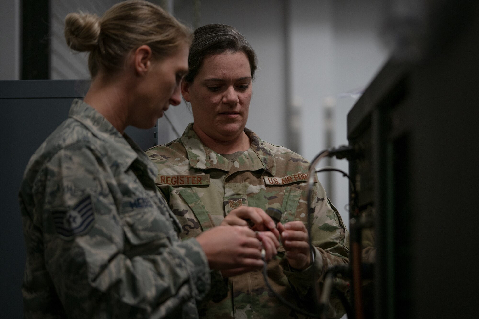 Tech. Sgt. Crystal Register inspects and repairs equipment Aug. 3, 2019, at Keesler Air Force Base, Mississippi. She serves in the Air Force Reserve as a meteorological equipment technician with the 403rd Maintenance Squadron. Her job duties include maintaining equipment and systems utilized to collect and transmit data for hurricanes, storm missions, and research. (U.S. Air Force photo by Staff Sgt. Shelton Sherrill)