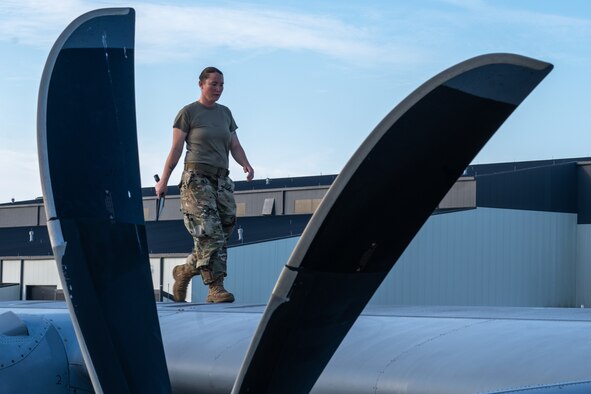 Tech. Sgt. Lacey Matthews inspects a C-130J Super Hercules July 30, 2019, at Keesler Air Force Base, Mississippi. She serves in the Air Force Reserve as a crew chief with the 403rd Aircraft Maintenance Squadron. Her job also includes performing aircraft maintenance, refueling and preparing the plane for takeoffs. (U.S. Air Force photo by Staff Sgt. Shelton Sherrill)