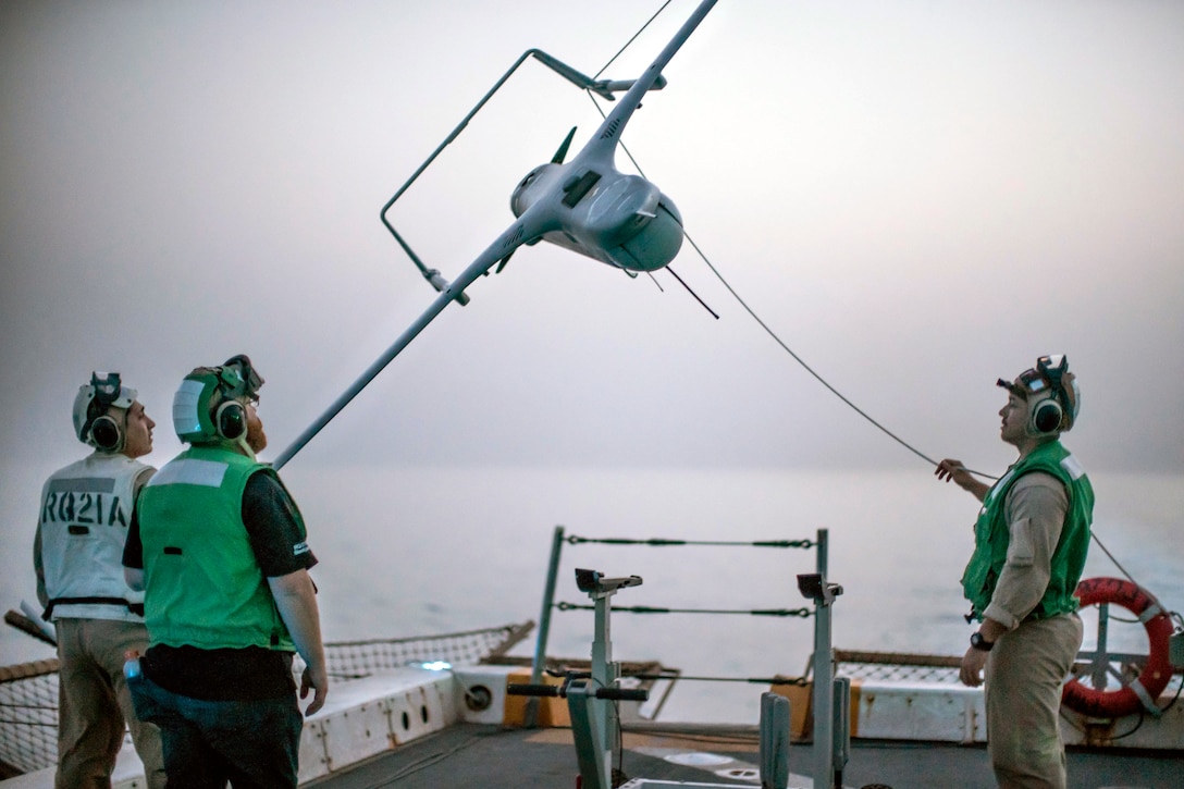 Marines lower RQ-21A Blackjack unmanned aerial system from recovery system aboard USS John P. Murtha, Gulf of Aden, July 2019 (U.S. Marine Corps/Adam Dublinske)