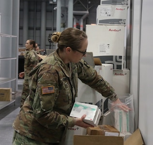Soldiers stock medical supplies