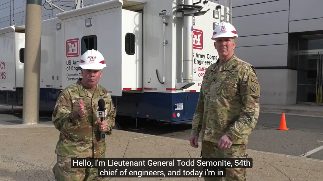 Lt. Gen. Todd Semonite, USACE Commanding General and 54th Chief of Engineers, speaks with New York District commander Col. Thomas Asbery on March 27, 2020, about Coronavirus response efforts at New York's Javits Convention Center in coordination with federal, state and local partners.