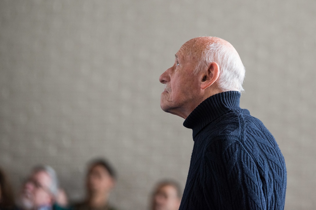 Paul Sobol, survivor of Auschwitz Concentration Camp, watches presentation about horrors of Holocaust during special Holocaust Remembrance Day observance, April 12, 2019, at Supreme Headquarters Allied Powers Europe,
Belgium (U.S. Army/Pierre-Etienne Courtejoie)