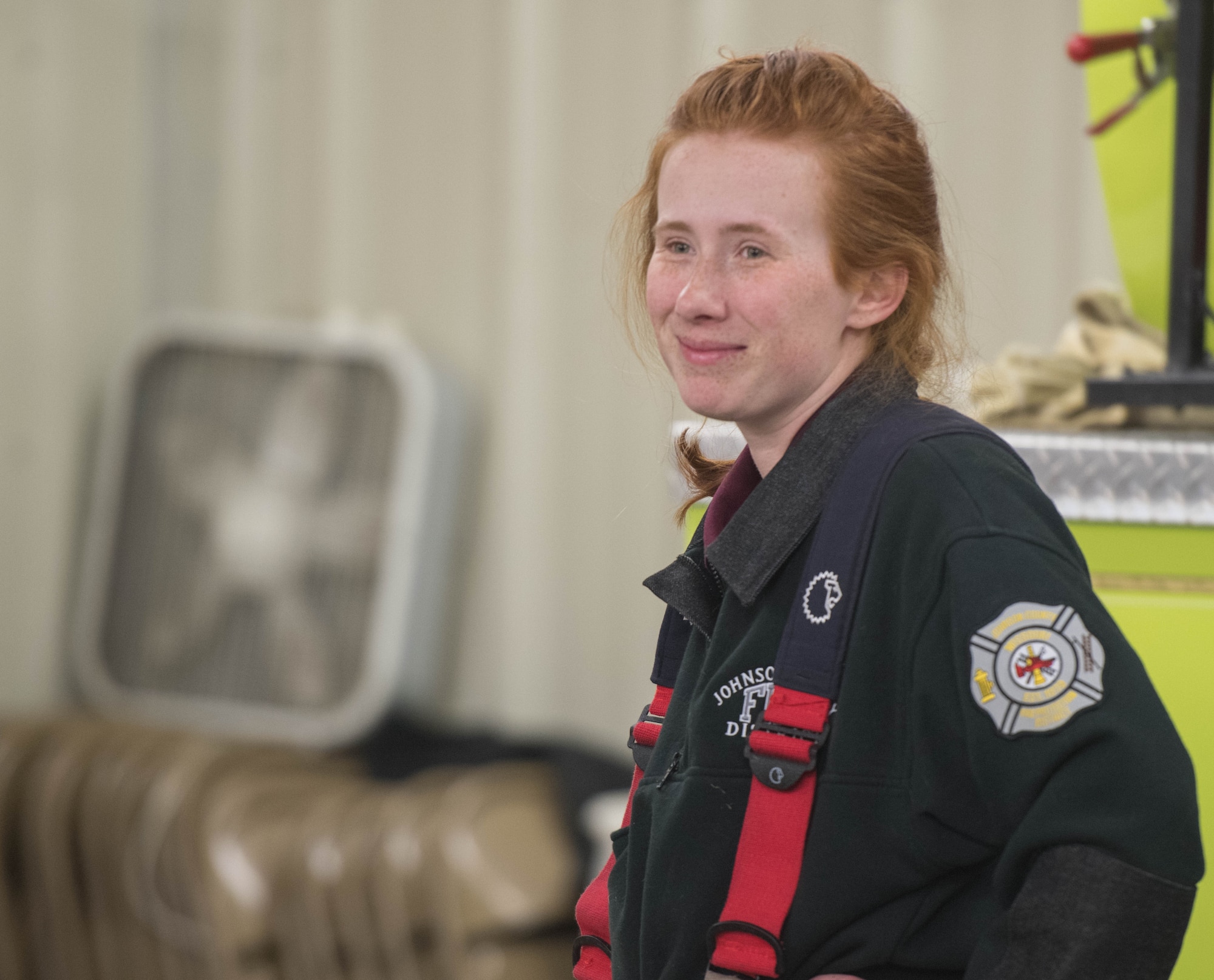 U.S. Air Force Senior Airman Lillian Johnson, a 509th Operations Support Squadron aircrew flight equipment technician, observes firefighter training at Johnson County Volunteer Fire Department in Knob Noster, Missouri, Feb. 28, 2020. Johnson volunteers as a firefighter to support the local community and gain new skills. (U.S. Air Force photo by Airman 1st Class Thomas Johns.)