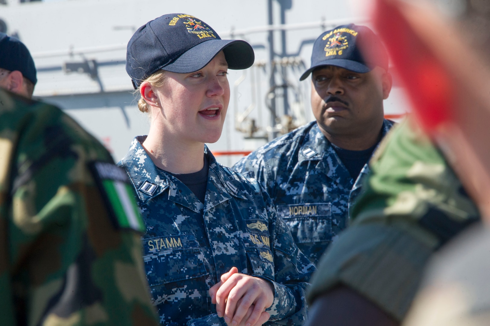 Navy officer answers questions from U.S. and international students of U.S. Army War College during tour of USS America, San Diego, California,
March 1, 2017 (U.S. Navy/Kyle Hafer)