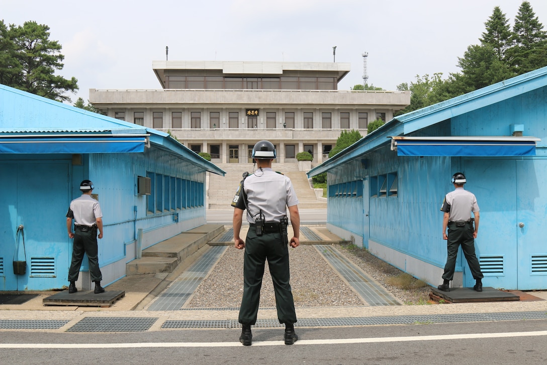 Republic of Korea army soldiers stand resolute at Joint Security Area where South and North Korean soldiers stand face-to-face across Korean
Demilitarized Zone, Panmunjom, South Korea, June 19, 2018 (U.S. Army/Richard Colletta)
