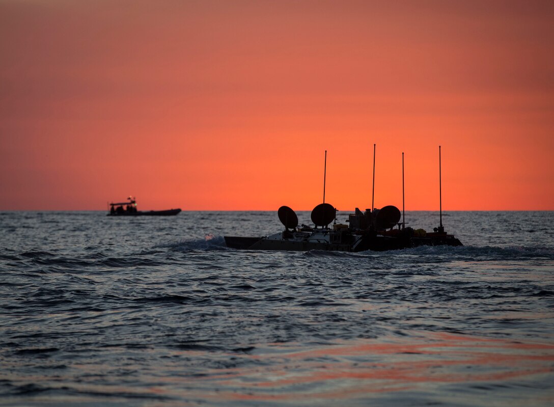 Marines take new Amphibious Combat Vehicle out for open-ocean low-light testing at Del Mar Beach on Marine Corps Base Camp Pendleton, California,
December 17, 2019 (U.S. Marine Corps/Andrew Cortez)