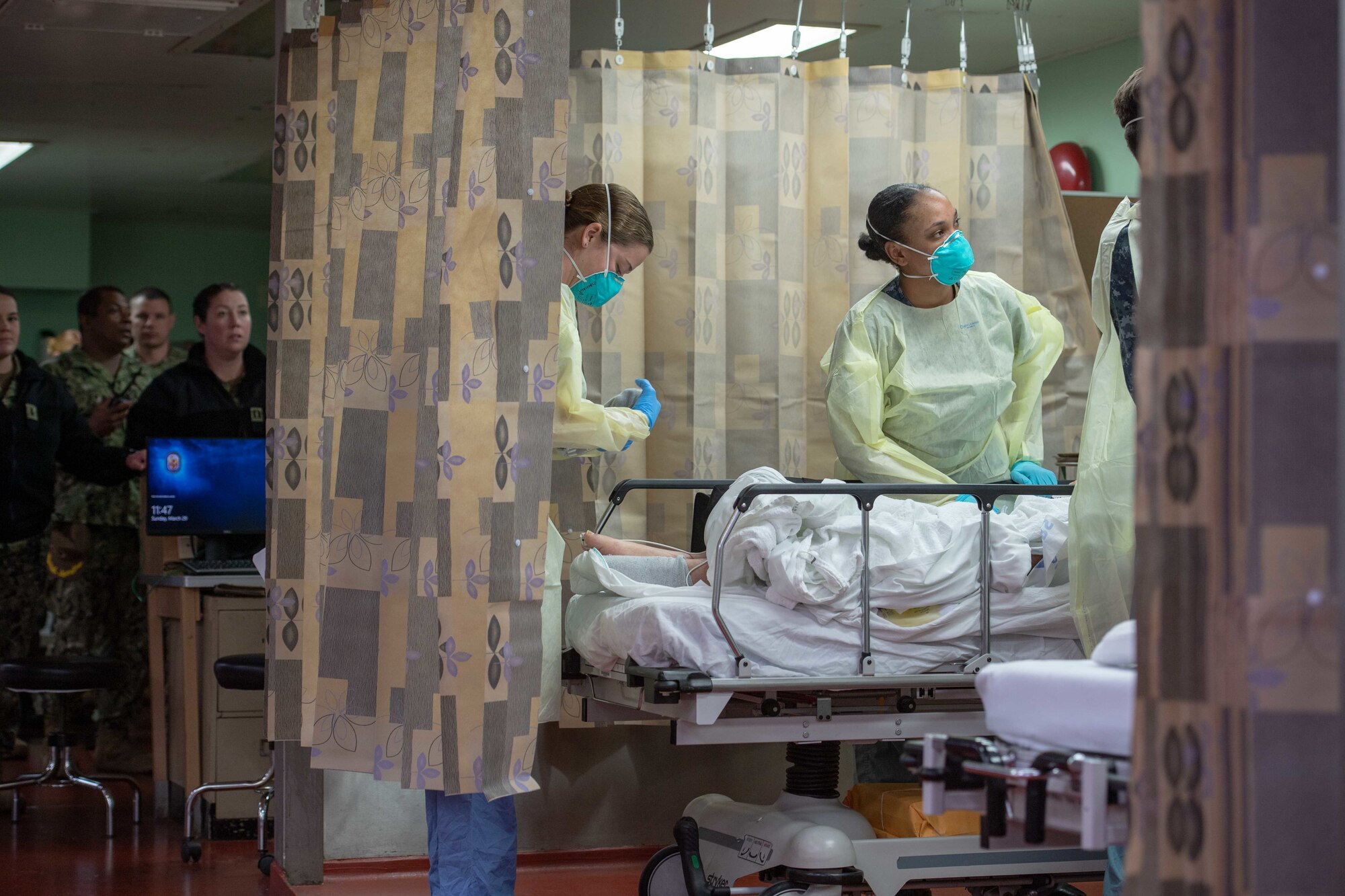 Medics treat a patient.