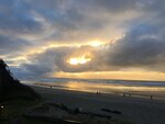 Sunshine peers through gloomy clouds, bringing rays of hope to Cannon Beach, Ore. February 23, 2019. (Courtesy photo by Emily Moon)