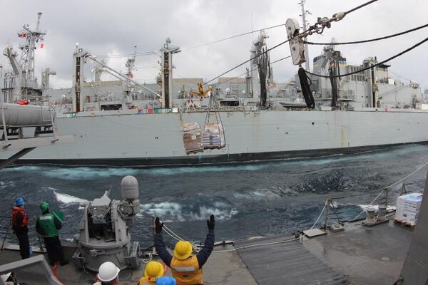 NORTH ATLANTIC (April 28, 2020) - The Arleigh Burke-class guided-missile destroyer USS Donald Cook (DDG 75) conducts a connected replenishment (CONREP) with USNS Supply (T-AOE 6) to receive fuel and stores, April 28, 2020. CNE-CAN/C6F, headquartered in Naples, Italy, oversees joint and naval operations, often in concert with Allied, joint, and interagency partners, in order to advance U.S. national interests and security and stability in Europe and Africa. (U.S. Navy photo by Yeoman Third Class Anthony Nichols/Released)