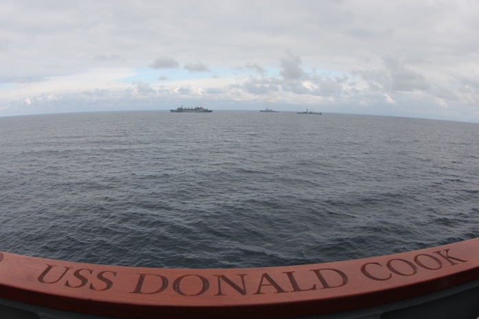 NORTH ATLANTIC (April 28, 2020)- The Arleigh Burke-class guided-missile destroyer USS Donald Cook (DDG 75), USNS SUPPLY (T-AOE 6), USS Porter (DDG 78), and Royal Navy’s HMS Kent (F 78) conduct a connected replenishment in the North Atlantic, April 28, 2020. CNE-CAN/C6F, headquartered in Naples, Italy, oversees joint and naval operations, often in concert with Allied, joint, and interagency partners, in order to advance U.S. national interests and security and stability in Europe and Africa. (U.S. Navy photo by Yeoman Third Class Anthony Nichols/Released)