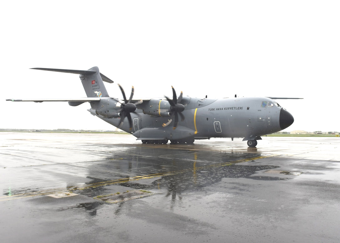 A Turkish Airbus A400M Atlas taxies upon arrival at RAF Mildenhall, England, April 28, 2020, before continuing on to Joint Base Andrews, Md., to deliver COVID-19 medical supplies. Airmen from RAF Mildenhall were ready and waiting to assist the crew and refuel the aircraft, demonstrating our mutual support of NATO allies during this difficult time. (U.S. Air Force photo by Karen Abeyasekere)