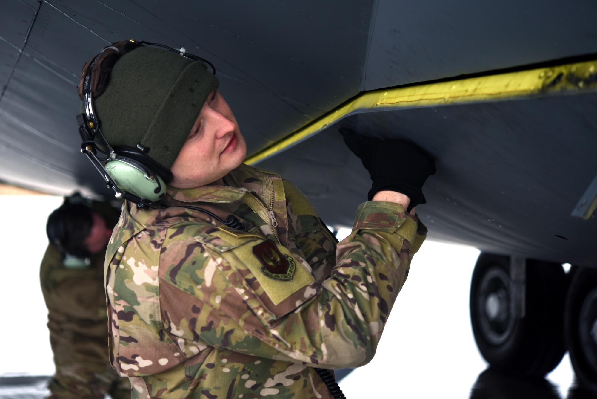 U.S. Air Force Staff Sgt. Shannon Nations, 100th Aircraft Maintenance Squadron flying crew chief, preps a KC-135 Stratotanker from RAF Mildenhall during training with Romanian air force F-16s in Bucharest, Romania, March 12, 2019. The crew was involved in training with Romanian air force F-16s over the skies of Romania, which enhanced regional capabilities to secure air sovereignty and promote peace and security through cooperation, collaboration, interoperability with NATO allies in the region. (U.S. Air Force photo by Airman 1st Class Brandon Esau)