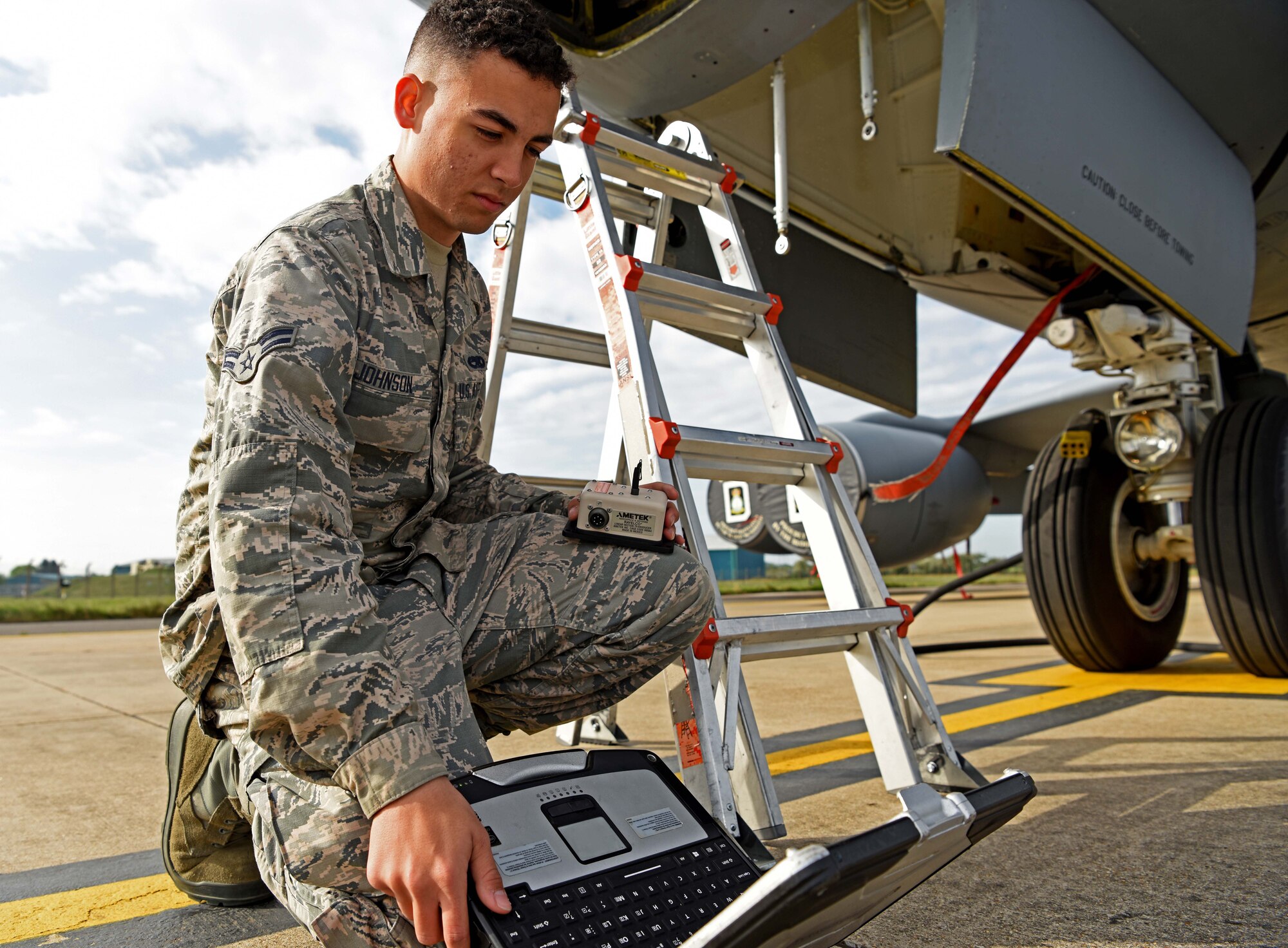 U.S. Air Force Airman 1st Class Noah Johnson, 100th Aircraft Maintenance Squadron instrument and flight control systems apprentice, looks over a technical order at RAF Mildenhall, England, May 2, 2019. Airmen are put through a training program, called Phase I, where they are put in classroom and flightline settings as part of upgrade training. (U.S. Air Force photo by Airman 1st Class Brandon Esau)