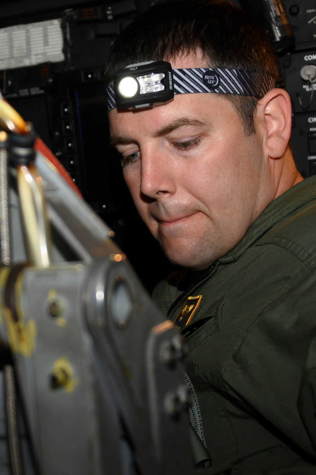 Photo of airman preparing for sortie