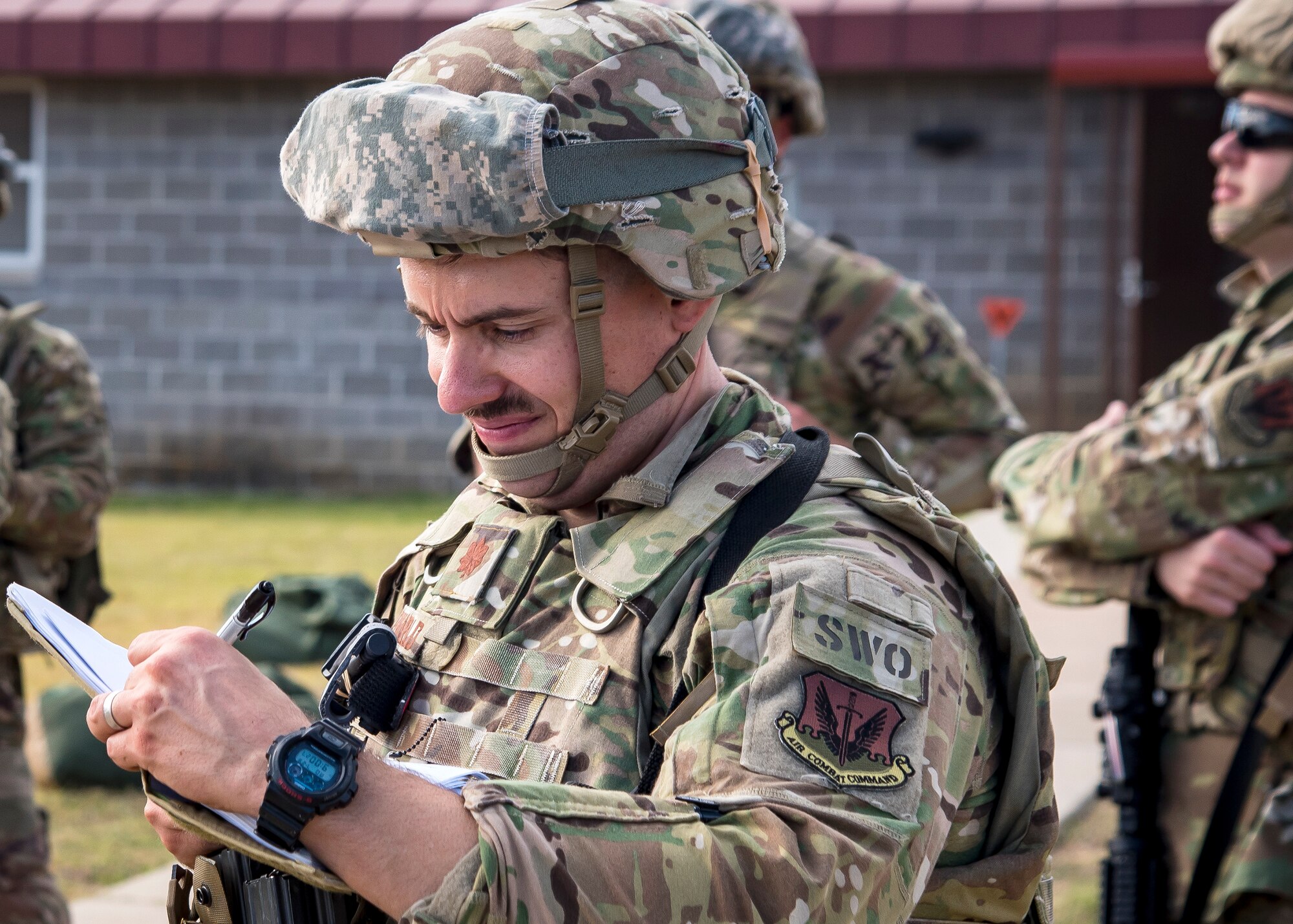 weather Airman takes notes