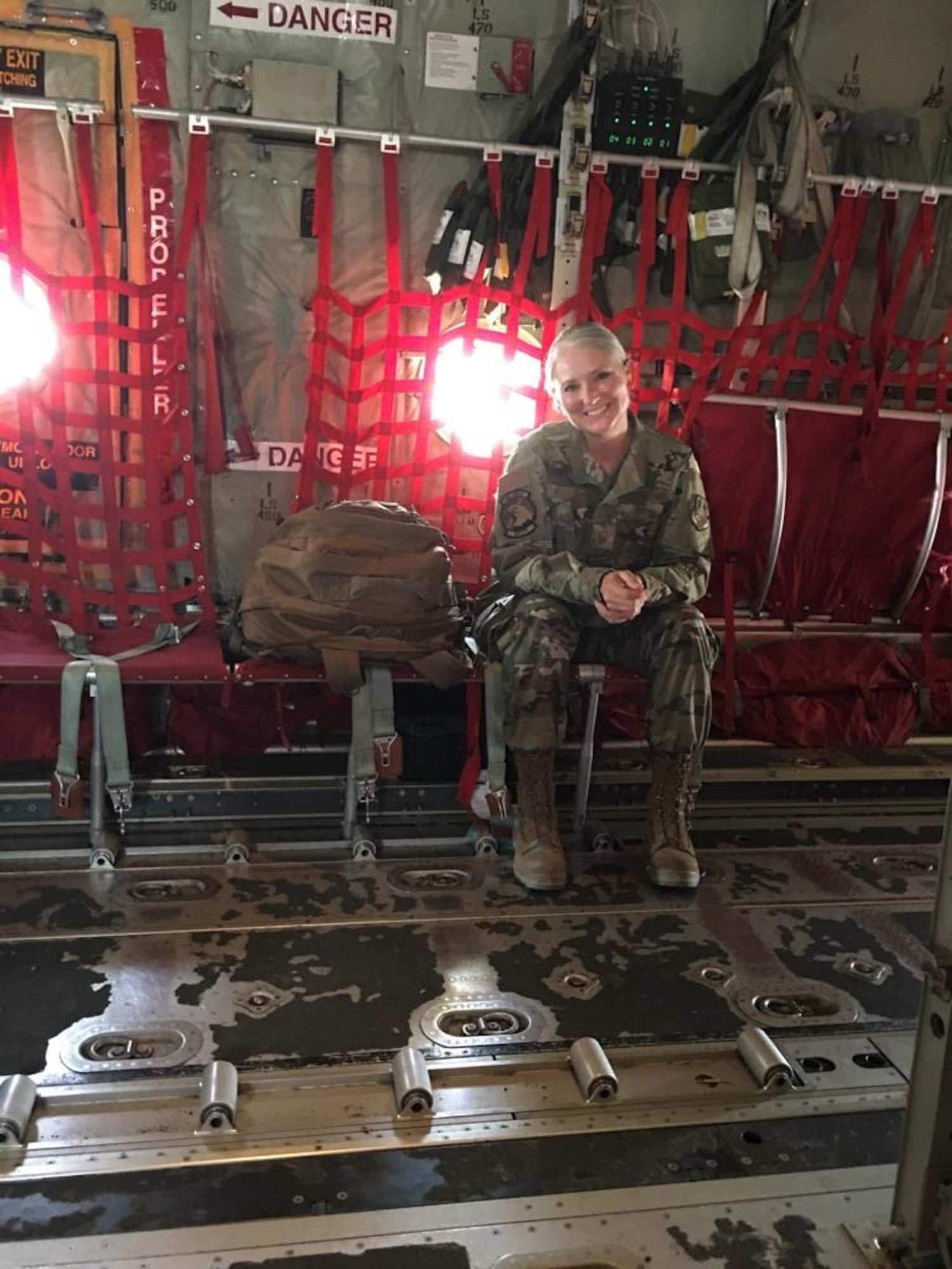 Senior Master Sgt. Joy Rohauer, 913th Airlift Group occupational safety manager, rides in the back of a C-130 Hercules to provide training and guidance to various deployed safety offices in the deployed region. During her deployment, she conducted site visits to various installations located throughout Southwest Asia to include Jordan, Iraq, and Kuwait. (Courtesy photo)