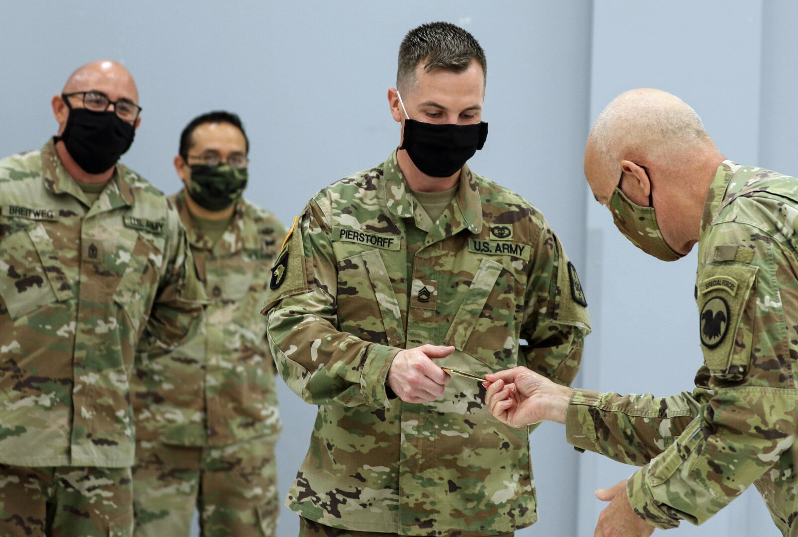 General presents coin