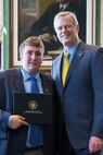 Zack Fernandez, Army family member, poses with Massachusetts Gov. Charlie Baker, at the State House in Boston, Mass., after being named the Hanscom Air Force Base 2019 Youth of the Year. Fernandez is the first member to receive the title in back-to-back years. (Courtesy photo)
