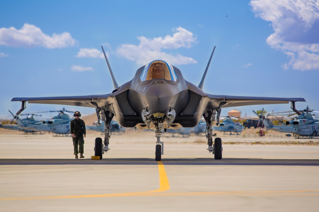 U.S. Marine Corps Lance Cpl. James Turner, a plane captain with Marine Fighter Attack Squadron 122, 3rd Marine Aircraft Wing, conducts a pre-flight check on an F-35B Lightning II at Marine Corps Air Station Yuma, AZ, March 23, 2020.