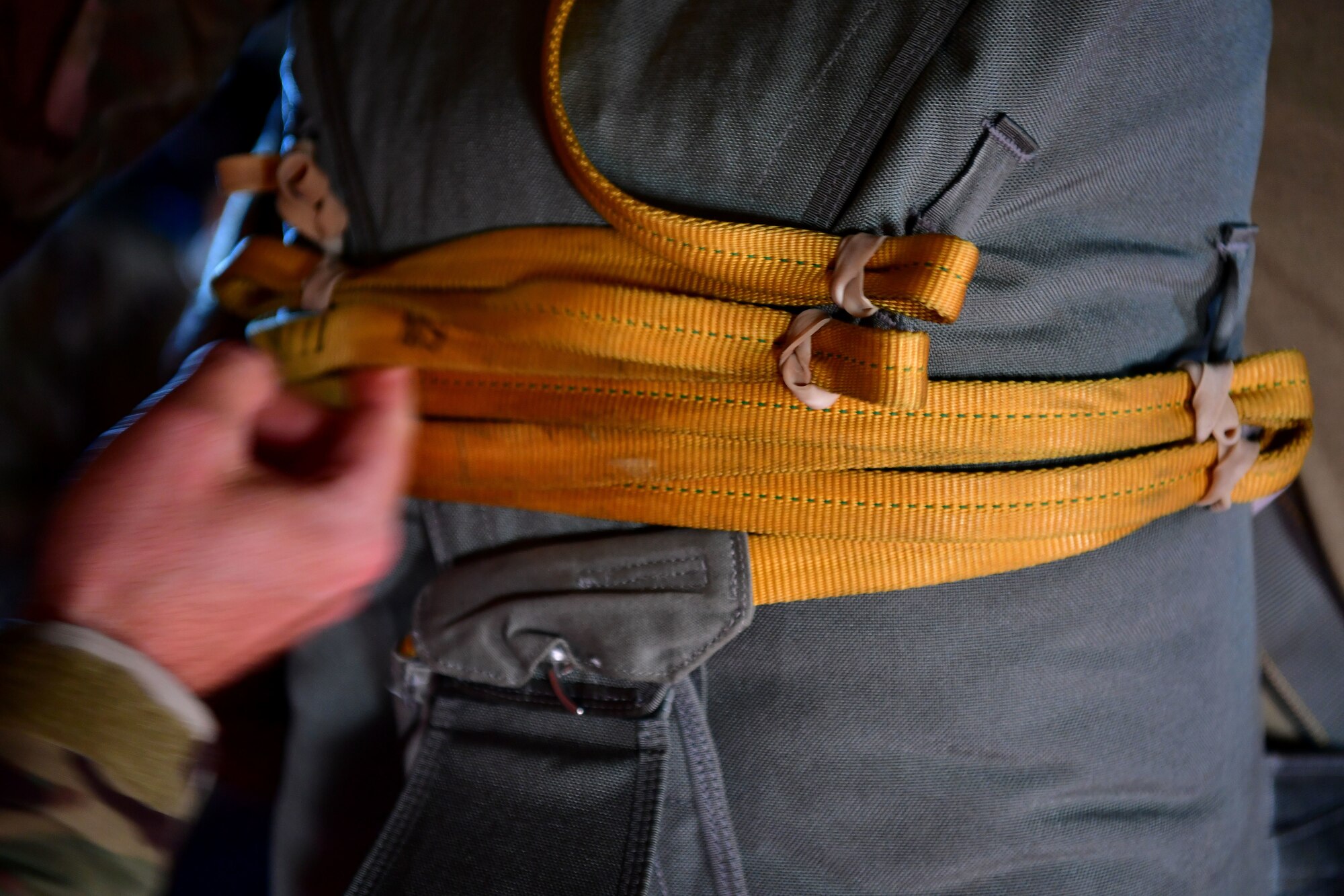 Master Sgt. Ed Dawejko, 19th Operations Support Squadron Survival Evasion Resistance and Escape specialist, performs an equipment check on U.S. Air Force Tech. Sgt. Nader Maghribi, 19th OSS SERE specialist, in Florida.