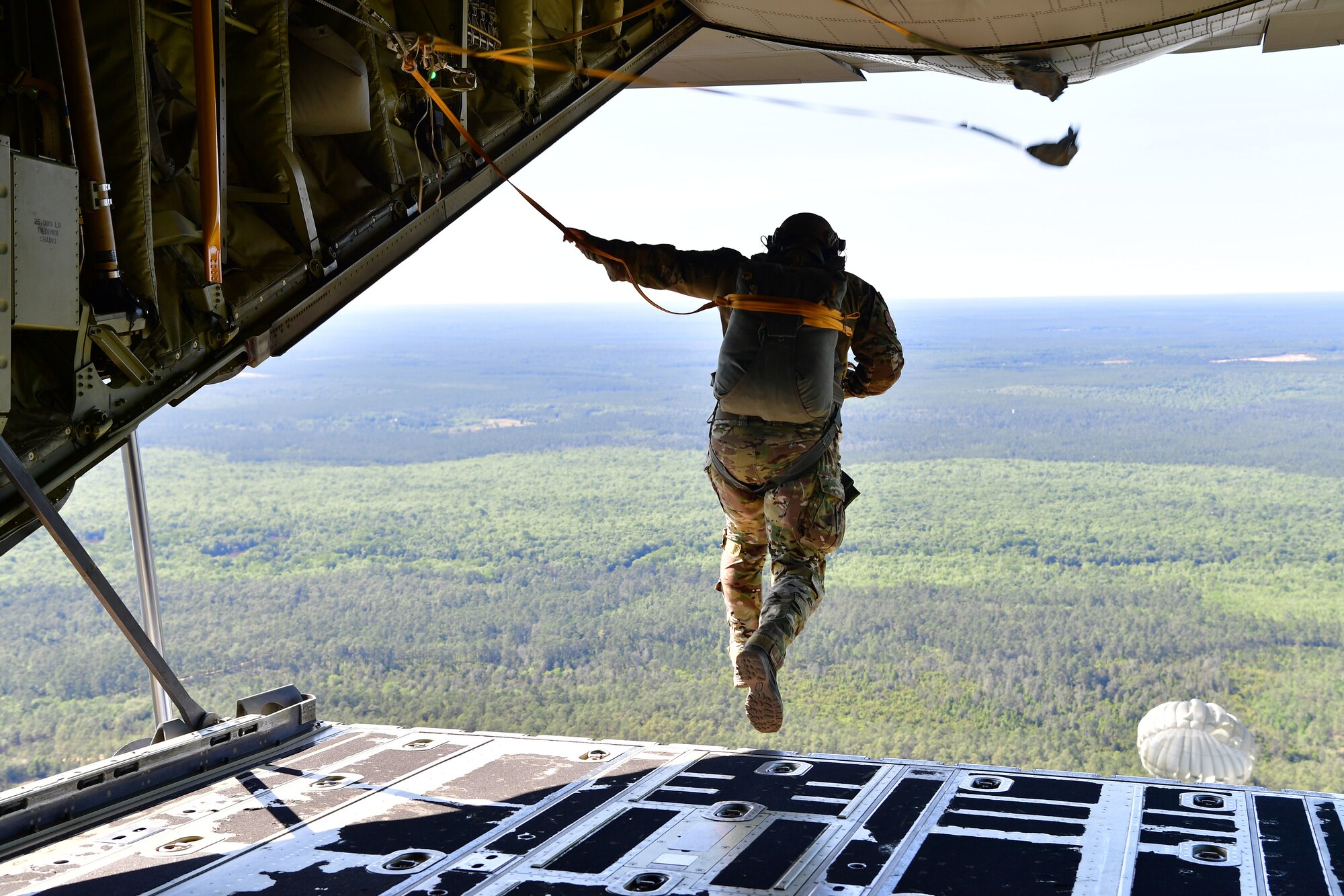 Master Sgt. Ed Dawejko, 19th Operations Support Squadron Survival Evasion Resistance and Escape specialist, performs a static-line jump over Sontay drop zone, Florida.