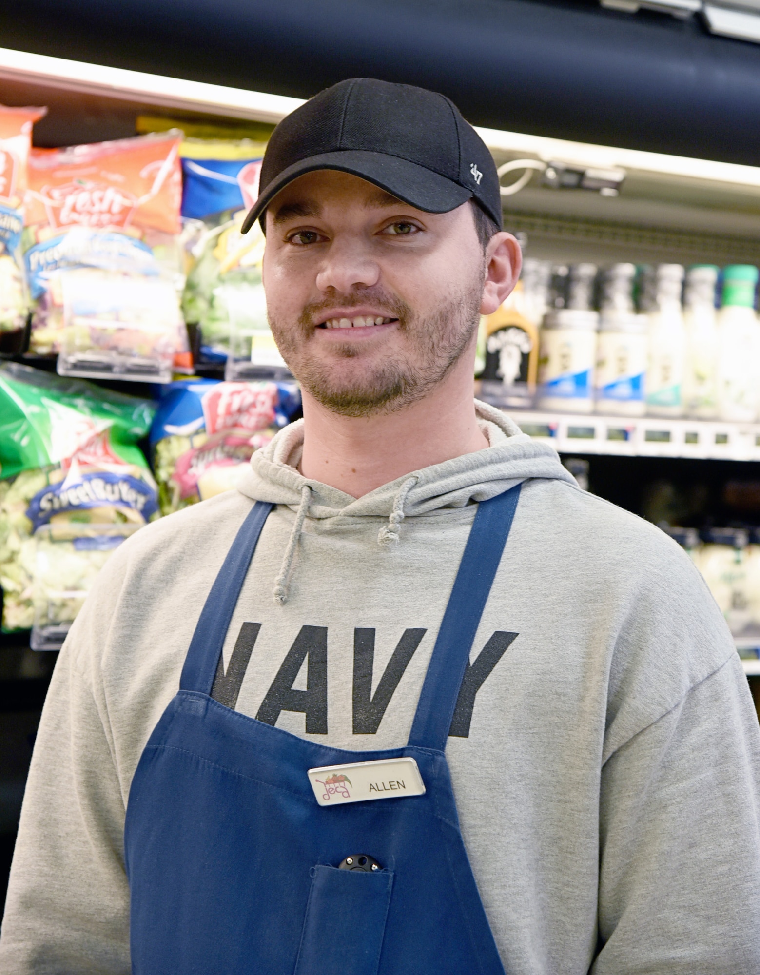 Allen Kalsem works in the produce section of the Tinker Commissary and has worked at the store for about six months. His duties include stocking shelves as quickly as possible after trucks come in and cleaning and disinfecting the produce area.