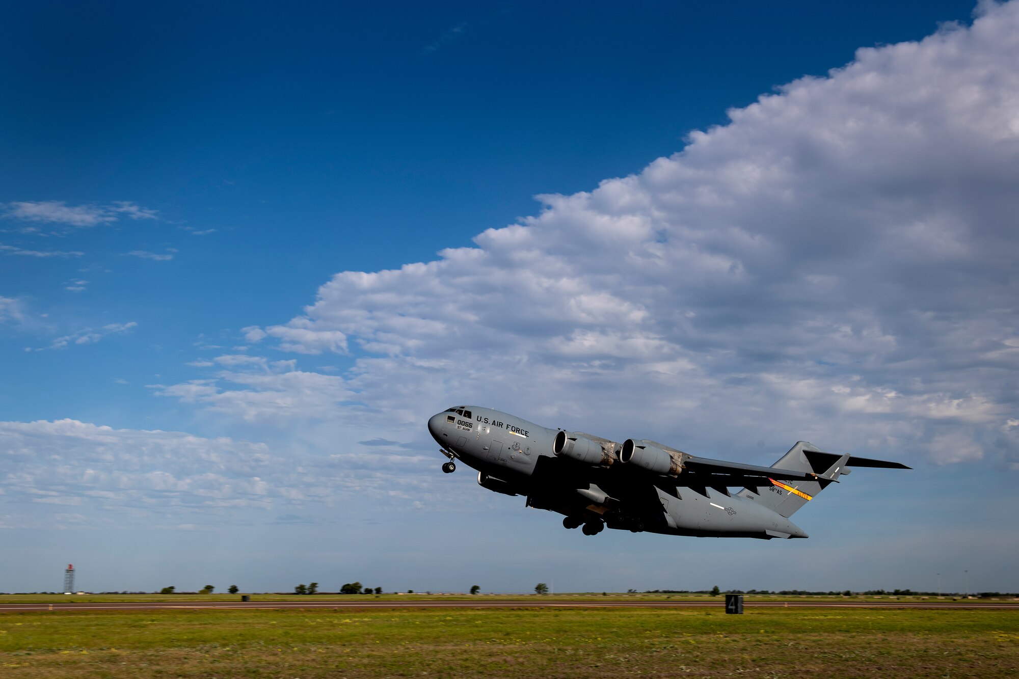 A U.S. Air Force C-17 Globemaster III assigned to the 58th Airlift Squadron, takes off from Altus Air Force Base, Oklahoma, in support of essential personnel fighting COVID-19, May 1, 2020.