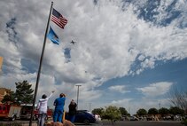 Employees of Jackson County Memorial Hospital (JCMH), wave as two KC-46 Pegasus aircraft flyover JCMH in Altus, Oklahoma, May 1, 2020.
