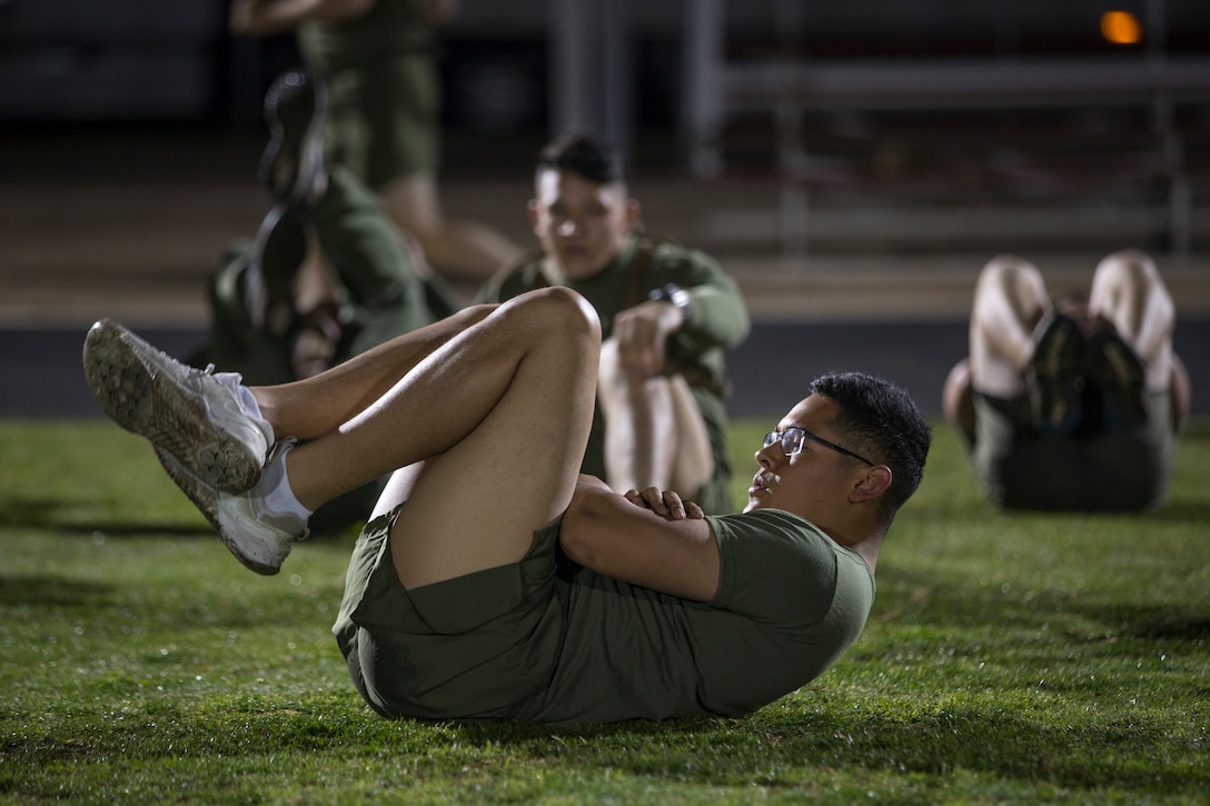 U.S. Marines and Sailors assigned to Headquarters and Headquarters Squadron (H&HS), Marine Corps Air Station (MCAS) Yuma, participate in a squadron phsyical training (PT) event on MCAS Yuma, March 6, 2020.